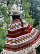 striped knit poncho with buttons and fringe hem women's vintage 1970's