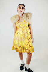 sleeveless knee length floral print yellow dress with ruffle trim vintage 1960s