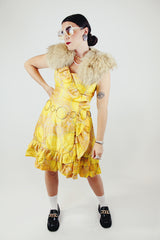 sleeveless knee length floral print yellow dress with ruffle trim vintage 1960s