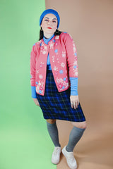 Women's vintage 1950's Gene Shelly's Miss Boutique California label 3/4 arm length open front pink cardigan sweater in wool material with blue, white, and pink embroidered flowers all over