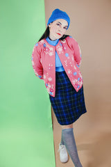 Women's vintage 1970's high waisted knee length wool plaid print pencil skirt. Blue with dark green, white, and black plaid print