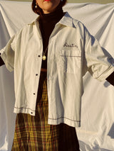 short sleeve white button up bowling shirt with black graphic vintage 1960's