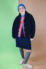 Women's vintage 1970's Woolrich Woman, Made in USA label long sleeve navy fleece sweater. Popper buttons up the front, two pockets, rolled collar, and white speckle print all over.