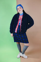 Women's vintage 1970's Woolrich Woman, Made in USA label long sleeve navy fleece sweater. Popper buttons up the front, two pockets, rolled collar, and white speckle print all over.