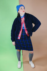 Women's vintage 1970's Woolrich Woman, Made in USA label long sleeve navy fleece sweater. Popper buttons up the front, two pockets, rolled collar, and white speckle print all over.