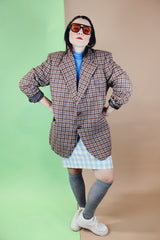 Men's vintage 1970's Varsity Town by Seinsheimer label long sleeve two button closure checkered blazer in brown, tan, and blue wool.