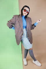 Men's vintage 1970's Varsity Town by Seinsheimer label long sleeve two button closure checkered blazer in brown, tan, and blue wool.