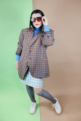 Men's vintage 1970's Varsity Town by Seinsheimer label long sleeve two button closure checkered blazer in brown, tan, and blue wool.