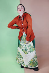 Men's vintage 1970's Joel California label long sleeve button up polyester material shirt in a rich burnt orange.