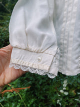 long sleeve cream blouse with mock neck and lace trim women's vintage 1970's