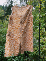 sleeveless brown and cream printed romper with zipper in the back short length women's vintage 1960's