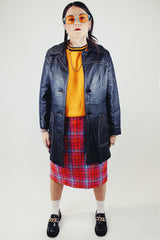 long sleeve black leather long jacket with double lapel, buttons, and white thread detail vintage 1970's