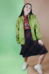 Men's or women's vintage 1960's Puritan Gary Player Sportswear, Made in USA label long sleeve olive green lightweight nylon bomber jacket with a zipper in the front.