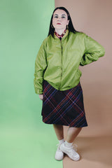 Men's or women's vintage 1960's Puritan Gary Player Sportswear, Made in USA label long sleeve olive green lightweight nylon bomber jacket with a zipper in the front.