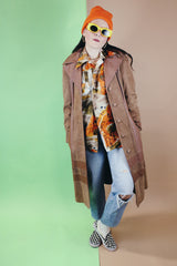 Women's vintage 1970's New England Sportswear Company label long length brown suede and leather trench coat that buttons up the front.