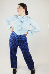 long sleeve blue zip up blouse with ruffle cuffs and trim vintage 1960's