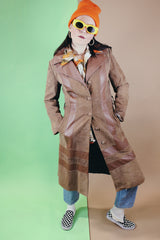 Women's vintage 1970's New England Sportswear Company label long length brown suede and leather trench coat that buttons up the front.