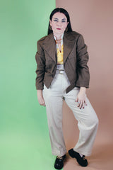 Men's vintage 1940's army cropped jacket in olive green wool material and fully lined in acetate