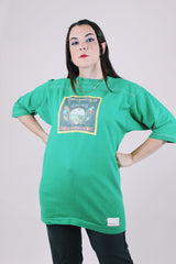 short sleeve green t-shirt 1975 charlie daniels with graphic on the front