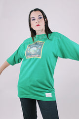 short sleeve green t-shirt 1975 charlie daniels with graphic on the front