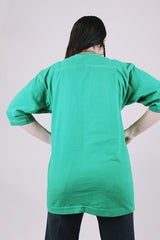 short sleeve green t-shirt 1975 charlie daniels with graphic on the front