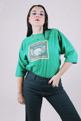 short sleeve green t-shirt 1975 charlie daniels with graphic on the front