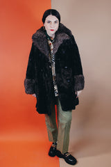 Women's vintage 1970's Styled by Davis of Boston, A Division of Jonathan Logan label long sleeve faux fur coat in two different tones of brown and texture.