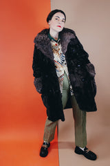 Women's vintage 1970's Styled by Davis of Boston, A Division of Jonathan Logan label long sleeve faux fur coat in two different tones of brown and texture.