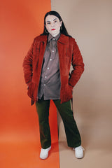 Women's vintage 1970's Genuine Leather, Made in Uruguay label burn orange suede leather zip up jacket with collar and matching tie belt and a faux fur liner