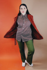 Women's vintage 1970's Genuine Leather, Made in Uruguay label burn orange suede leather zip up jacket with collar and matching tie belt and a faux fur liner