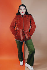 Women's vintage 1970's Genuine Leather, Made in Uruguay label burn orange suede leather zip up jacket with collar and matching tie belt and a faux fur liner