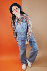 Men's vintage 1970's JCPenney label long sleeve button up shirt with a pointy collar in a slinky and lightweight Polyester material. Light blue, grey, and terracotta all over abstract print.