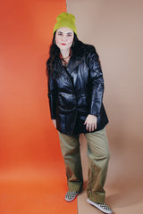 Women's vintage 1970's Adler Leather, Made in California label long sleeve black leather jacket with a double breasted closure