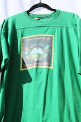 short sleeve green t-shirt 1975 charlie daniels with graphic on the front