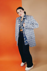 Men's vintage 1970's Montgomery Ward polyester double breasted blazer in a grey and blue plaid print.