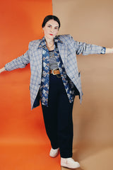 Men's vintage 1970's Montgomery Ward polyester double breasted blazer in a grey and blue plaid print.