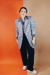 Men's vintage 1970's Montgomery Ward polyester double breasted blazer in a grey and blue plaid print.
