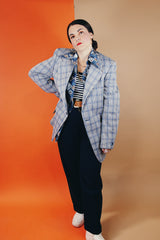 Men's vintage 1970's Montgomery Ward polyester double breasted blazer in a grey and blue plaid print.