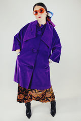 purple velvet coat with 3/4 arm length buttons up the front and attached neck tie vintage women's 1960's