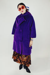 purple velvet coat with 3/4 arm length buttons up the front and attached neck tie vintage women's 1960's