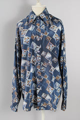 Men's or women's vintage 1970's Fleur Antique, Chemise Et Cie label long sleeve lightweight Polyester material with a silk feel button up shirt in blue with white and brown all over floral print.