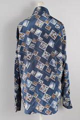 Men's or women's vintage 1970's Fleur Antique, Chemise Et Cie label long sleeve lightweight Polyester material with a silk feel button up shirt in blue with white and brown all over floral print.