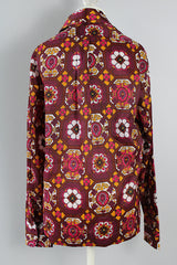 Women's or men's vintage 1970's Marlboro label long sleeve button up shirt with point collar in a lightweight polyester material and magenta, brown, orange, and white all over print.