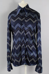 Women's or men's vintage 1970's Roland label long sleeve button up shirt with a pointy collar in navy slinky polyester with a zig zag print.
