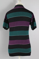 Women's vintage 1980's Le Tigre, Made in USA label short sleeve striped polo t-shirt with a black ribbed collar and two button half closure.