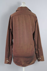 Men's or women's vintage 1970's Van Heusen Sportswear label long sleeve button up shirt with a pointy collar in a soft lightweight Polyester material. Brown with white polka dots.