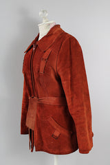 Women's vintage 1970's Genuine Leather, Made in Uruguay label burn orange suede leather zip up jacket with collar and matching tie belt and a faux fur liner