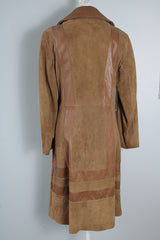 Women's vintage 1970's New England Sportswear Company label long length brown suede and leather trench coat that buttons up the front.
