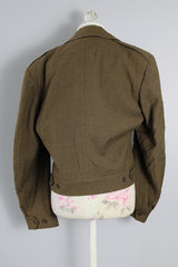 Men's vintage 1940's army cropped jacket in olive green wool material and fully lined in acetate