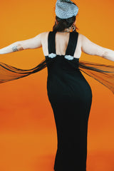 sleeveless ankle length black dress with two front slits and sweetheart bust vintage 1980's